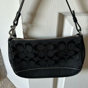 Coach black purse super cute.